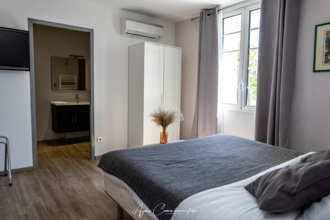 Logis Du Champ De Mars Otel Puy-Saint-Martin Dış mekan fotoğraf